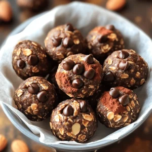 - 1 cup rolled oats - 1/2 cup almond butter (or any nut butter) - 1/4 cup honey or maple syrup - 1/4 cup unsweetened cocoa powder - 2 tablespoons espresso powder (or instant coffee) - 1/4 cup chocolate chips (dark or semi-sweet) - 1/4 cup chopped nuts (such as almonds or walnuts) - 1/4 teaspoon sea salt - 1 teaspoon vanilla extract You can switch almond butter for peanut butter or sunflower seed butter. Maple syrup works well if you prefer it over honey. If you want a sweeter bite, add more honey or a dash of agave syrup. For a caffeine-free version, use carob powder instead of cocoa powder. You can also swap espresso powder for decaf coffee if you want less caffeine. - Rolled oats provide fiber, which helps with digestion. - Nut butter gives healthy fats and protein. - Honey or maple syrup adds natural sweetness and quick energy. - Cocoa powder is rich in antioxidants, promoting heart health. - Espresso powder boosts energy and improves focus. - Chocolate chips add flavor and a small amount of iron. - Chopped nuts offer protein and healthy fats for energy. - Sea salt balances flavors and helps with hydration. - Vanilla extract enhances taste and may improve mood. These ingredients come together to make a delicious and healthy snack. Each bite packs a punch of flavor and energy. To start, gather your ingredients. You need: - 1 cup rolled oats - 1/2 cup almond butter (or any nut butter) - 1/4 cup honey or maple syrup - 1/4 cup unsweetened cocoa powder - 2 tablespoons espresso powder (or instant coffee) - 1/4 cup chocolate chips (dark or semi-sweet) - 1/4 cup chopped nuts (such as almonds or walnuts) - 1/4 teaspoon sea salt - 1 teaspoon vanilla extract In a medium bowl, mix the rolled oats, almond butter, honey or maple syrup, unsweetened cocoa powder, and espresso powder. Stir until the mix is smooth and a dough forms. You want it to be sticky but not too wet. Next, add the chocolate chips, chopped nuts, sea salt, and vanilla extract. Stir again to make sure everything is well mixed. Each ingredient should blend in nicely. Now it’s time to shape your energy bites. Scoop out small portions of the mixture, about 1 inch wide. Roll each portion into a ball using your hands. This part is fun! Place the rolled balls on a baking sheet lined with parchment paper. You should have around 20 bites when you're done. Make sure they are spaced out. This helps them cool evenly. Once all the bites are rolled, put the baking sheet in the fridge. Let them chill for at least 30 minutes. This helps them firm up and stay together. After chilling, move the bites to an airtight container. They can last in the fridge for up to 2 weeks. Enjoy them as a quick snack or a tasty treat on the go! When making Chocolate Espresso Energy Bites, avoid overmixing the dough. If you mix too much, the bites may become tough. Make sure to measure your ingredients carefully. Too much nut butter can make the bites greasy. Also, if you skip chilling them, they won't hold their shape well. You can boost the flavor in these bites. Try adding a pinch of cinnamon or a dash of sea salt. You can also fold in dried fruits like cranberries or cherries. For a nutty crunch, add seeds like chia or flaxseed. These will not only add taste but also extra nutrition. Batch cooking is smart for busy days. You can make a big batch of these energy bites and store them. After rolling, chill and then freeze them for a longer shelf life. When you want a snack, just grab one from the freezer. They will thaw quickly, making them perfect for a quick energy boost anytime. {{image_2}} You can mix it up with these great ideas. Try adding a splash of almond extract for a nutty twist. Want a fruity bite? Add dried cranberries or raisins. You can also use peanut butter instead of almond butter for that classic taste. For a spicy kick, consider adding a pinch of cinnamon or cayenne pepper. Each option gives you a new taste experience. Making these energy bites vegan is simple. Swap honey for maple syrup. This keeps the sweetness but makes it plant-based. For gluten-free bites, ensure your oats are certified gluten-free. All other ingredients are naturally gluten-free, so you’re good to go! These changes help everyone enjoy a tasty treat. Feel free to play with the ingredients to match your taste. If you love crunch, add more chopped nuts or seeds. If you like chocolate, increase the chocolate chips. You can even use different nut butters, like cashew or sunflower seed butter, to change the flavor. This way, you create a snack that fits your style. To keep your Chocolate Espresso Energy Bites fresh, store them in the refrigerator. Place them in an airtight container. This helps maintain their taste and texture. They can last up to two weeks in the fridge. Ensure you always close the container tightly to prevent them from drying out. If you want to save some for later, freezing is a great option. First, lay the energy bites on a baking sheet. Freeze them for about two hours. This makes them firm. After they are frozen, transfer them to a freezer-safe bag. You can store them in the freezer for up to three months. When you want one, just take it out and let it thaw. These energy bites work well as a snack anytime. I love pairing them with a cup of coffee or tea. They also go great with yogurt or fruit. For a fun twist, try rolling them in shredded coconut or crushed nuts. This adds more flavor and texture. Enjoy these bites as a pick-me-up before a workout or during a busy day! Yes, you can use any nut butter. Almond butter is my favorite, but peanut butter works too. Cashew butter adds a nice creaminess. Just choose one that you like. Each nut butter brings its own flavor and health benefits. These energy bites last up to two weeks in the fridge. Store them in an airtight container to keep them fresh. If you freeze them, they can last up to three months. Just thaw them in the fridge before enjoying! Yes, you can skip the espresso powder. If you want a caffeine boost, use instant coffee instead. You can also add more cocoa powder for a richer chocolate taste. These bites will still be tasty and energizing! In this post, I covered how to make tasty Chocolate Espresso Energy Bites. We explored the ingredients, their benefits, and easy substitutions. I shared step-by-step instructions and helpful tips to enhance your flavor. Variations let you customize these bites to your taste. Remember, you can easily adapt this recipe for your needs. Enjoy your homemade snacks! Keep experimenting and have fun with these energy bites in the kitchen.